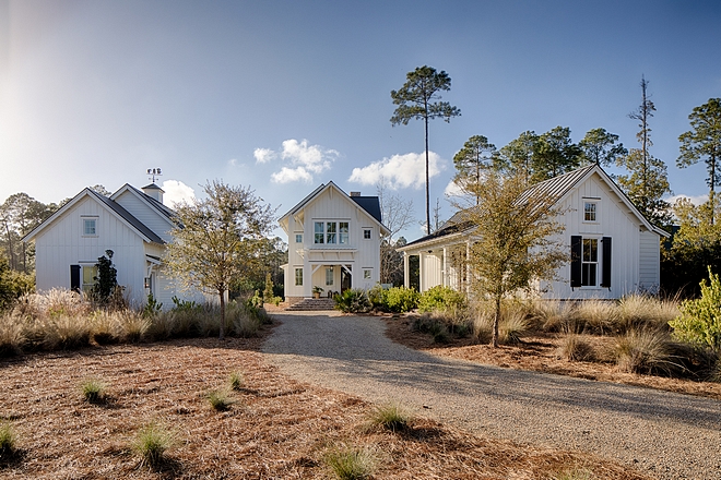 Board and batten coastal cottage in Palmetto Bluff with modern farmhouse interior design by Lisa Furey. #coastalcottage #boardandbatten #interiordesign