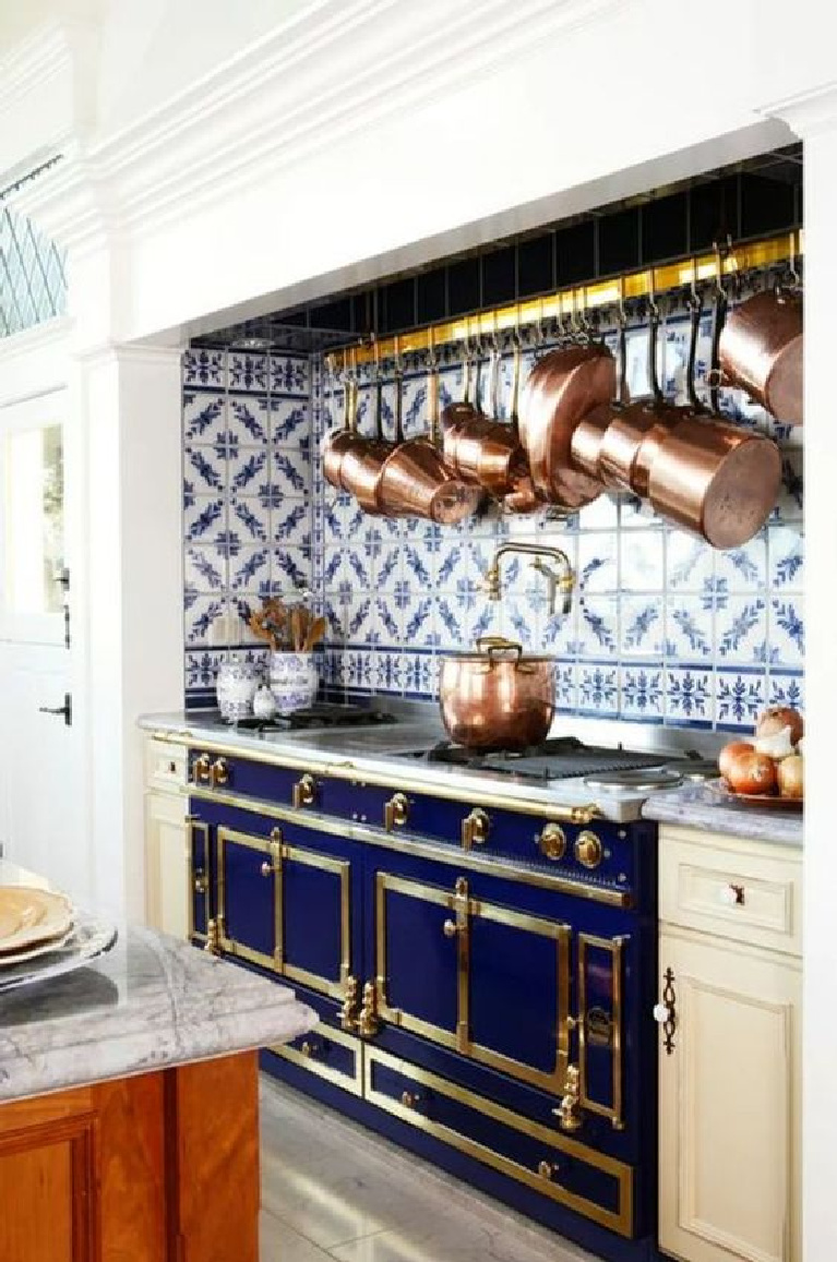 Delft Tile in the Kitchen. Come see 36 Best Beautiful Blue and White Kitchens to Love! #blueandwhite #bluekitchen #kitchendesign #kitchendecor #decorinspiration #beautifulkitchen