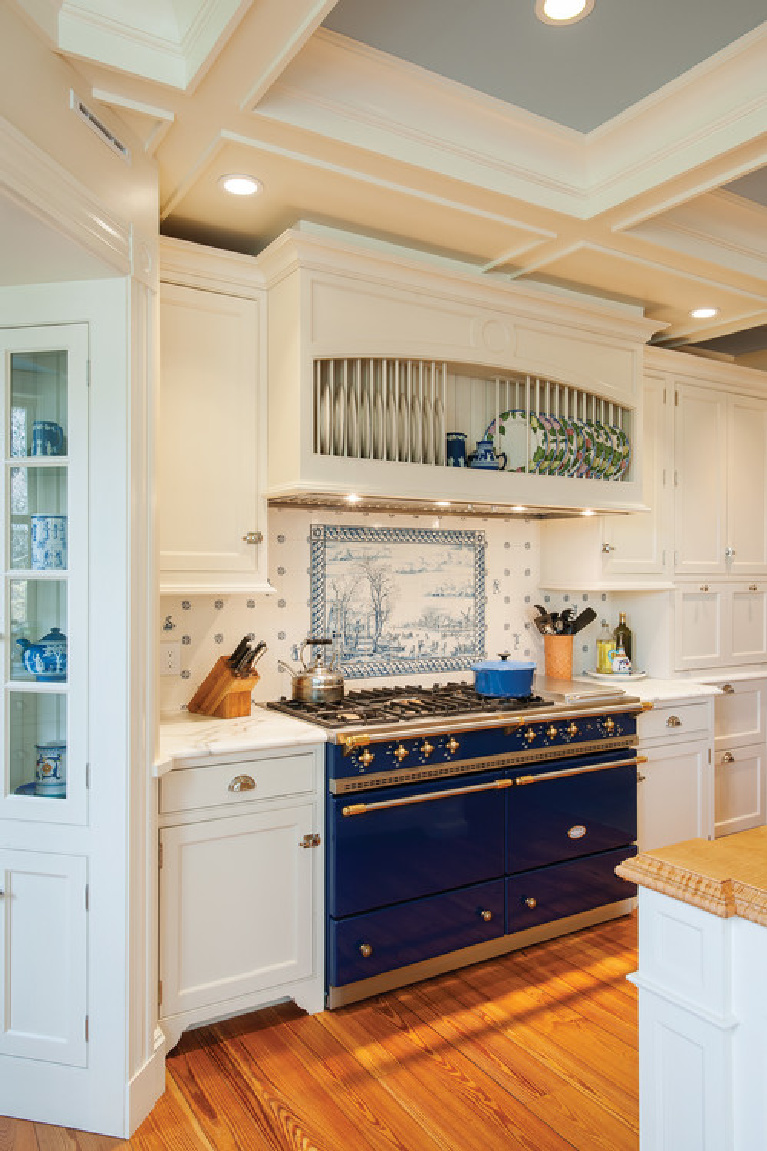 Blue Stove in Farmhouse Kitchen with delft tile. Come see 36 Best Beautiful Blue and White Kitchens to Love! #blueandwhite #bluekitchen #kitchendesign #kitchendecor #decorinspiration #beautifulkitchen