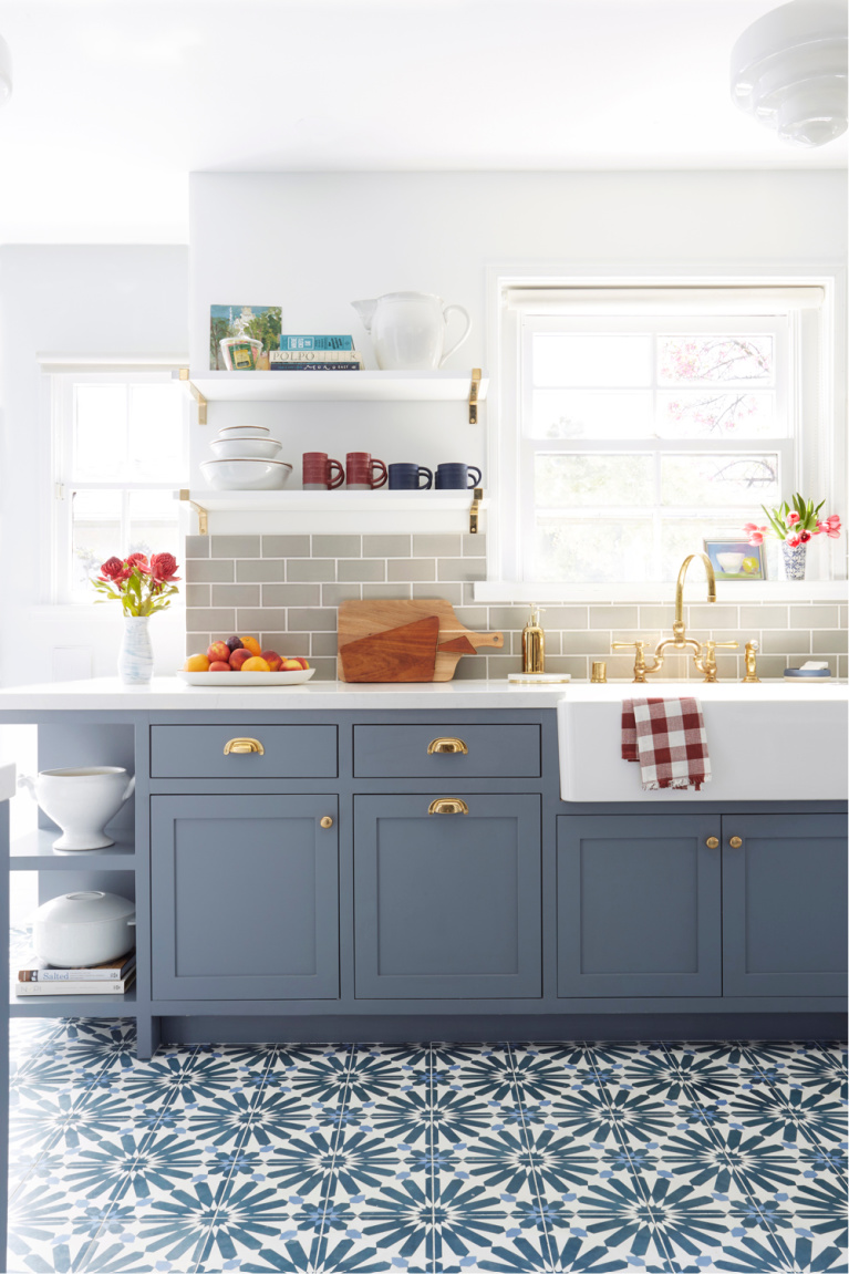 Beautiful medium blue kitchen cabinets and blue cement tile flooring. Come see 36 Best Beautiful Blue and White Kitchens to Love! #blueandwhite #bluekitchen #kitchendesign #kitchendecor #decorinspiration #modernfarmhousekitchen