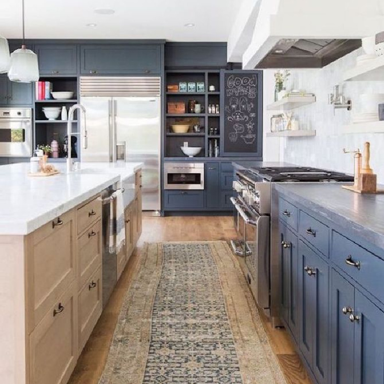 Thea Home blue kitchen with wood island and open shelving. #bluekitchens