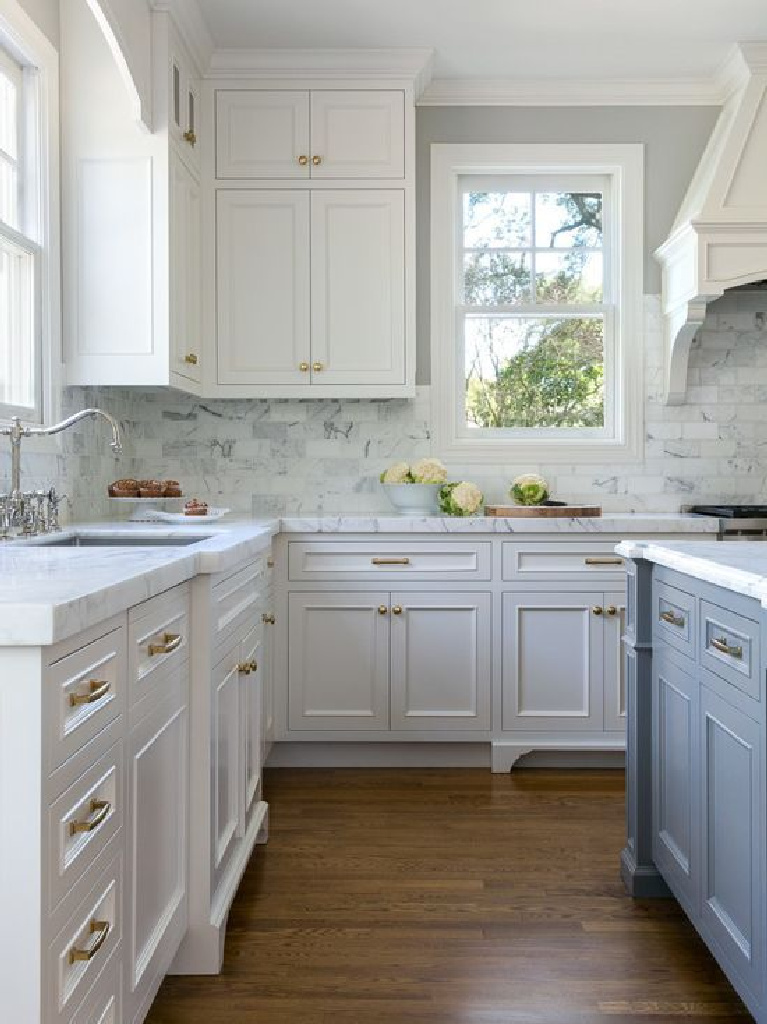 Christine Sheldon designed two tone kitchen - try Behr French Colony for a similar look on island. #bluekitchens