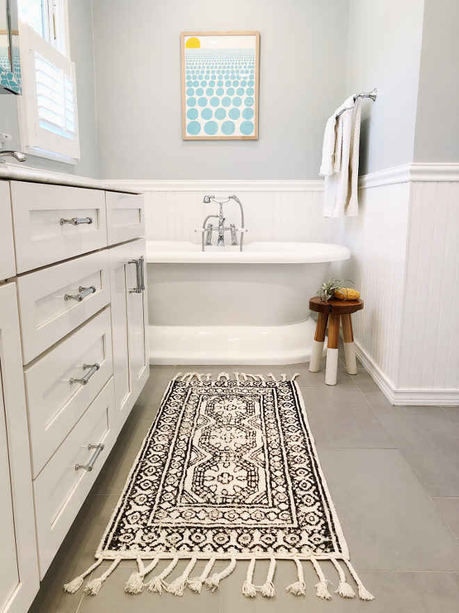 Behr Light French Gray paint in bathroom with freestanding tub - The Heart and Haven. #paintcolors #lightfrenchgray #behr #bluegrey #bathroomdesign