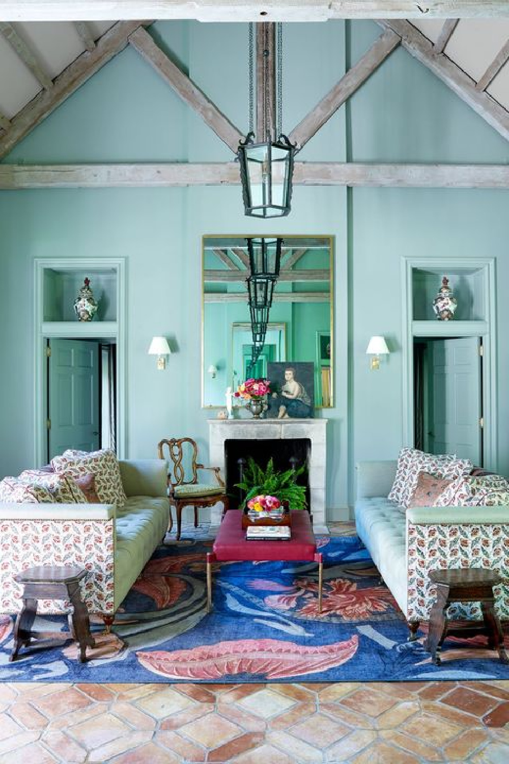 Turquoise blue walls in a family room with lofty ceiling - House Beautiful. #turquoise #beachylivingroom