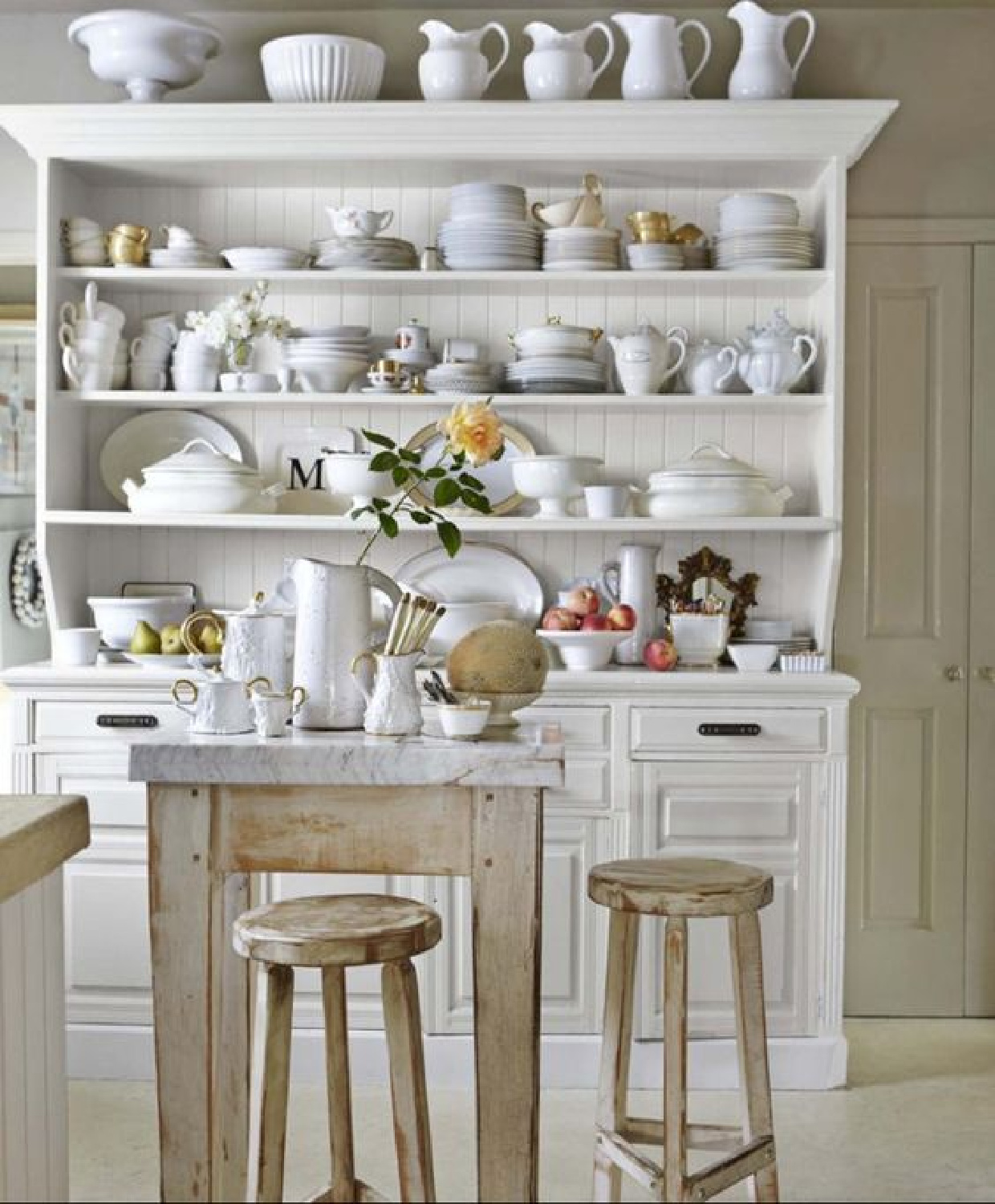 Rustic French country white country kitchen by Myra Hoefer in a Parisian 1925 home.