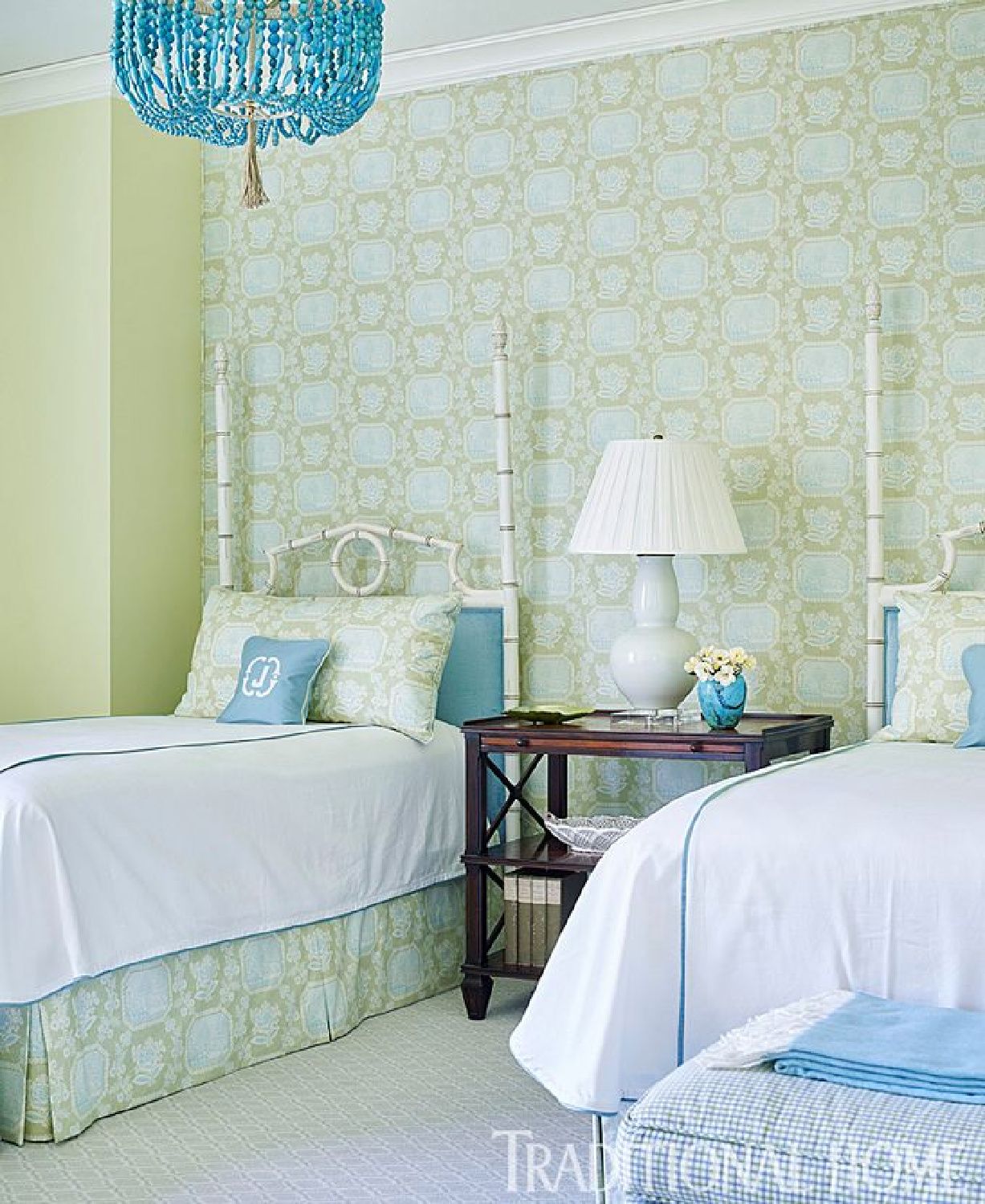 Turquoise accents in a lovely bedroom with twin poster beds - Traditional Home. #coastalbedrooms #turquoise