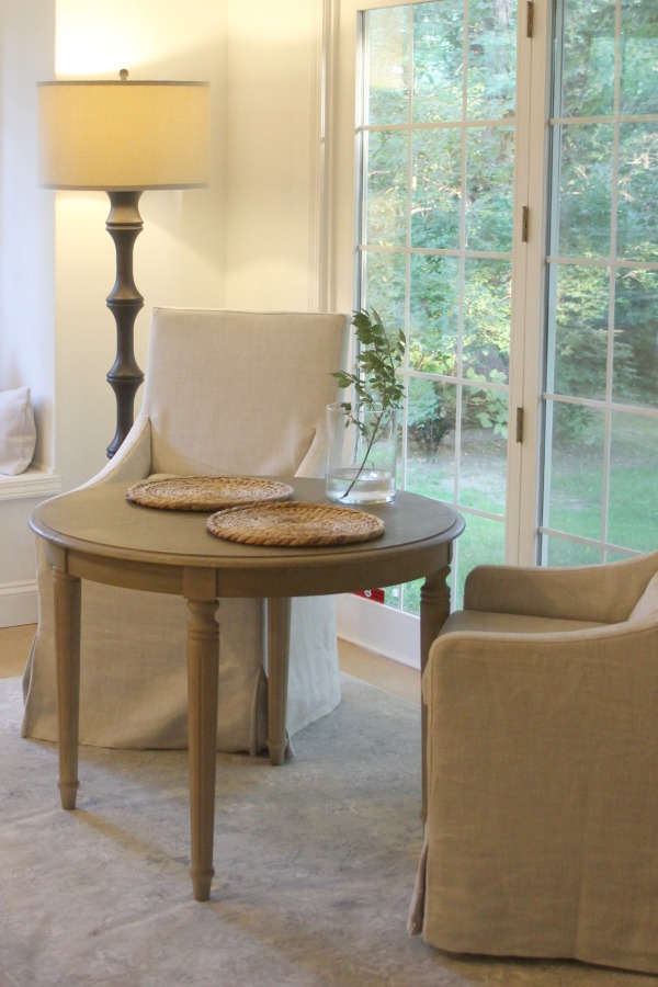 Window seat with linen pillows in European country inspired serene kitchen. Come see more of my home in Hello Lovely House Tour in July. #hellolovelystudio #timeless #tranquil #interiordesign #europeancountry #europeanfarmhouse #simpledecor #serenedecor