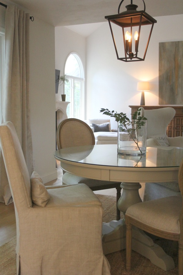 European country inspired serene dining room - Hello Lovely Studio. When You Need the Perfect Linen Slipcovered Chairs & Linen Upholstered Seating...certainly a lovely collection of options indeed.