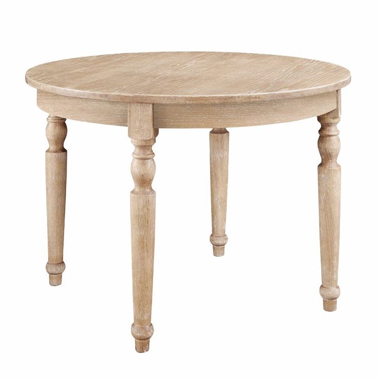 Rustic round wood farm dining table.