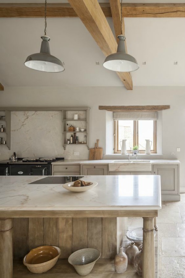 Modern rustic bespoke kitchen by Artichoke in Gloucestershire, England. Flemish design details, painted kitchen cabinetry, bronze hardware, and Bental White marble