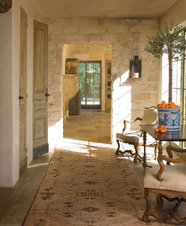 Chateau Domingue Timeless European Elegance and French farmhouse style converge in this house tour of founder Ruth Gay's home on Hello Lovely. Reclaimed stone, antique doors and mantels, and one of a kind architectural elements. #housetour #frenchcountry #frenchfarmhouse #europeanfarmhouse #chateaudomingue #rusticdecor #pamelapierce #elegantdecor #antiques