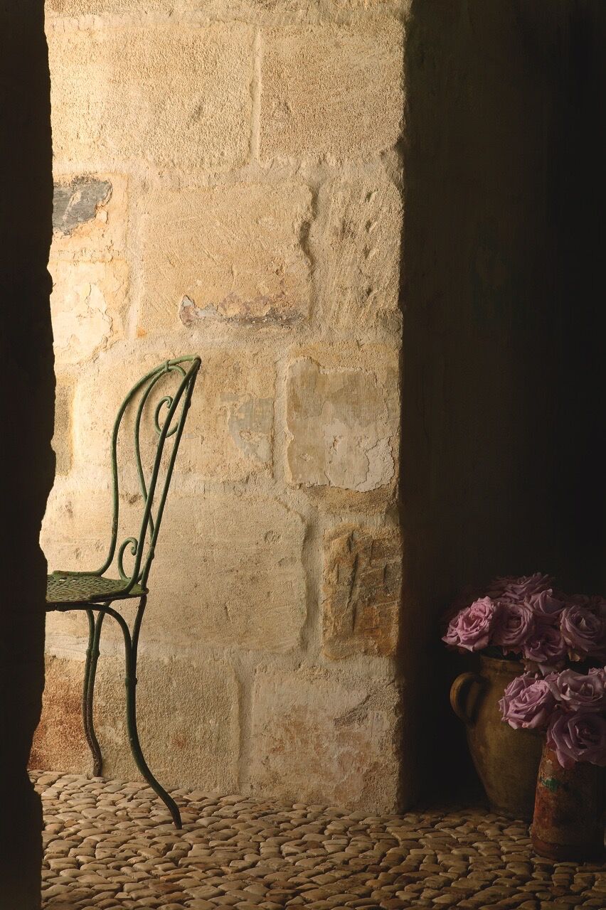 Chateau Domingue Timeless European Country Interiors in this house tour of Ruth Gay's home on Hello Lovely. Reclaimed stone, antique doors and mantels, and one of a kind architectural elements. #housetour #frenchcountry #frenchfarmhouse #europeanfarmhouse #chateaudomingue #rusticdecor #pamelapierce #elegantdecor #limestone #antiques