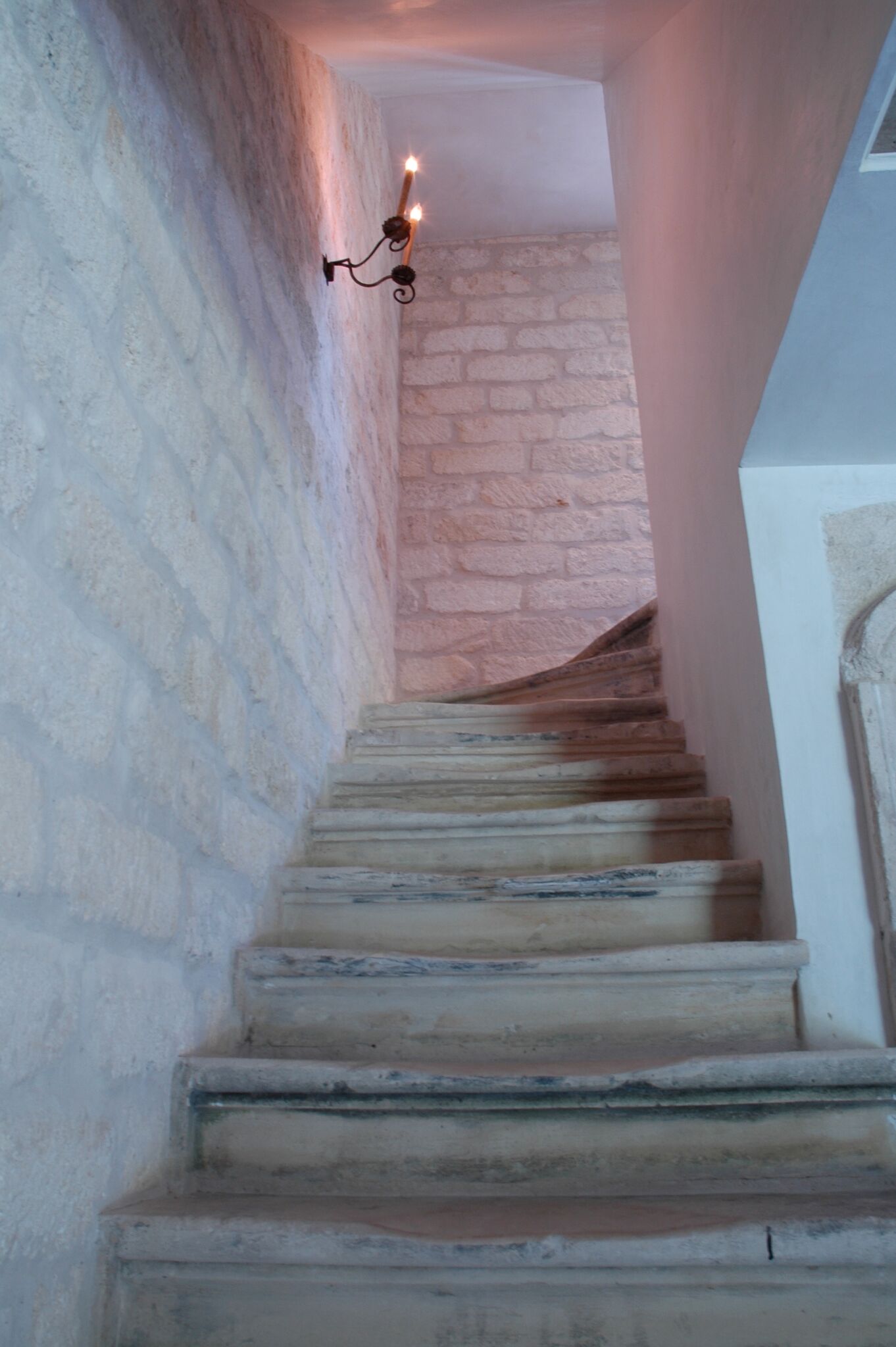 A stone staircase in a magnificent French country home. Chateau Domingues. #chateaudomingue #staircase #reclaimedstone #pamelapierce #staircase