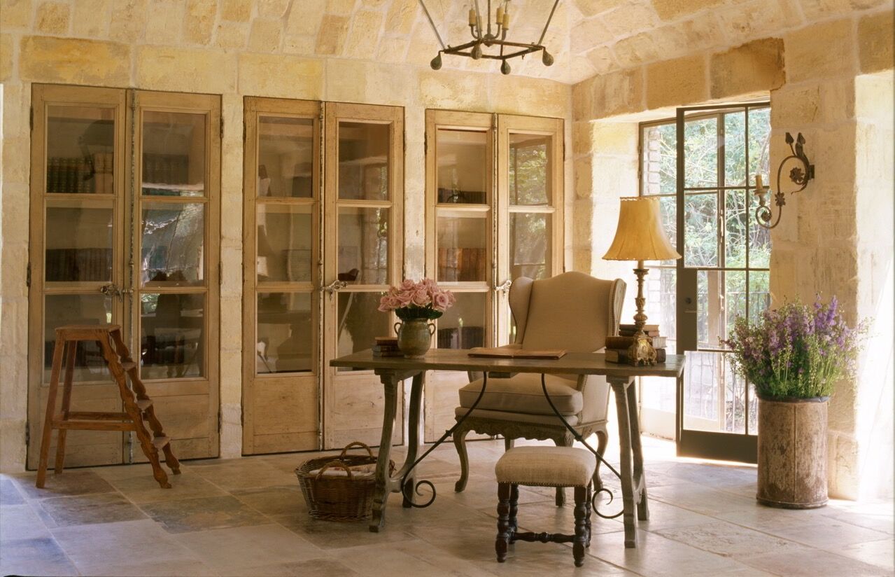 Chateau Domingue Timeless European Elegance and French farmhouse style converge in this house tour of founder Ruth Gay's home on Hello Lovely. Reclaimed stone, antique doors and mantels, and one of a kind architectural elements. #housetour #frenchcountry #frenchfarmhouse #europeanfarmhouse #chateaudomingue #rusticdecor #pamelapierce #elegantdecor #antiquedoors #limesstone #interiordesign