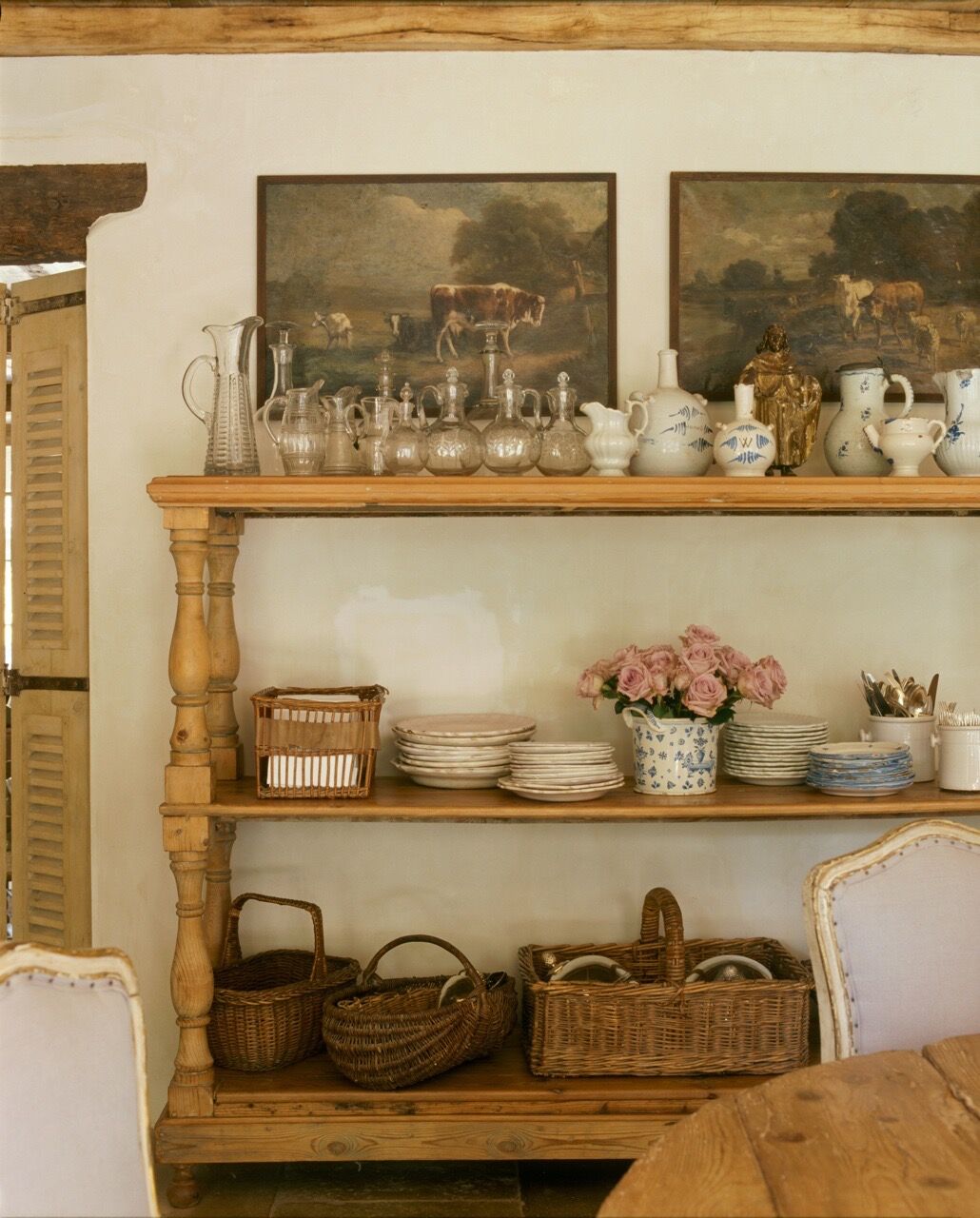 Chateau Domingue Timeless European Elegance and French farmhouse style converge in this house tour of founder Ruth Gay's home on Hello Lovely. Reclaimed stone, antique doors and mantels, and one of a kind architectural elements. #housetour #frenchcountry #frenchfarmhouse #europeanfarmhouse #chateaudomingue #rusticdecor #pamelapierce #elegantdecor #shelves