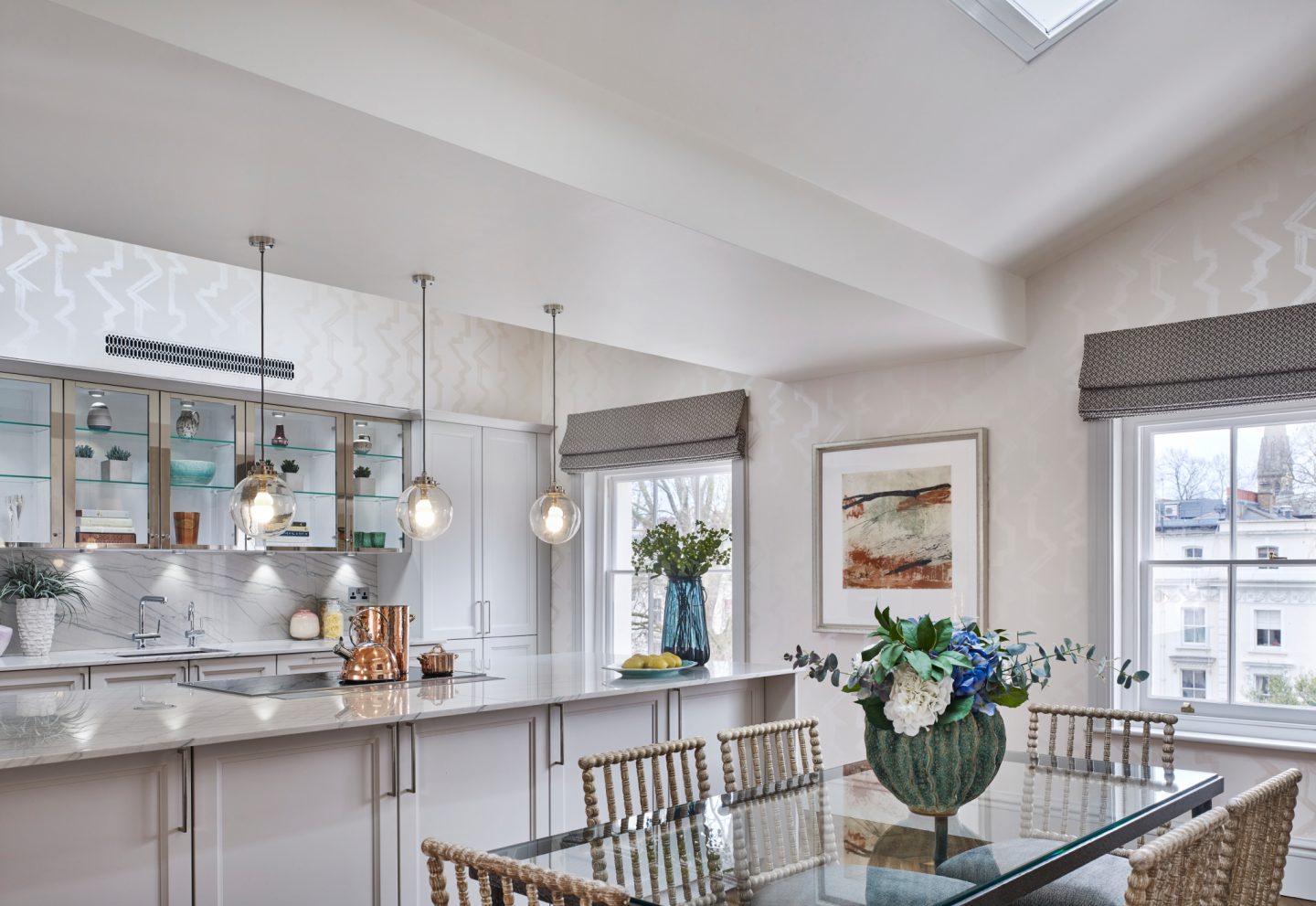 White bespoke kitchen in London apartment. Colorful Classic Decor in London Inspired by 'Out of Africa' - come see more from Studio L London! #britishcolornial #livingroom #pinkandgreen #elegantdecor #Londonapartment #interiordesigninspiration