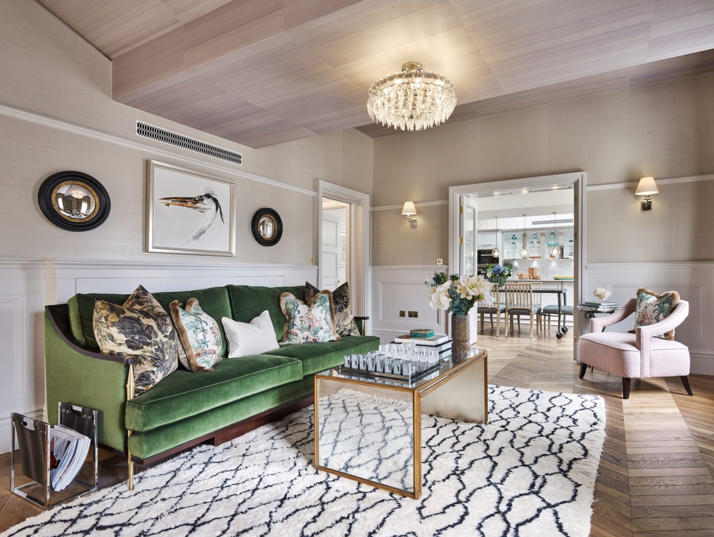 Sitting room in London apartment. Colorful Classic Decor in London Inspired by 'Out of Africa' - come see more from Studio L London! #britishcolornial #livingroom #pinkandgreen #elegantdecor #Londonapartment #interiordesigninspiration