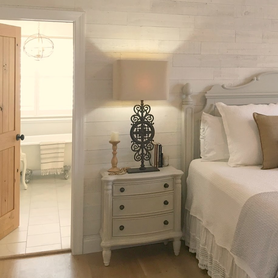 French farmhouse inspired bedroom by Hello Lovely Studio. Stikwood (Hamptons) statement wall behind bed. #hellolovelystudio #stikwood #hamptons #bedroomdecor #frenchfarmhouse #shiplap #statementwall #cottagestyle #interiordesign #farmhousestyle