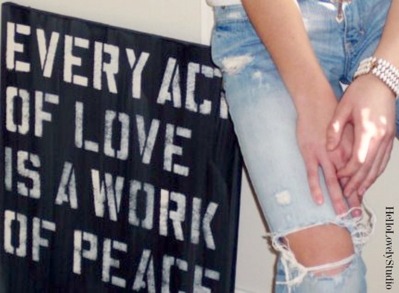 Hello Lovely Studio painting with Mother Teresa quote (Every act of love is a work of peace) and model with distressed ripped jeans. #hellolovelystudio #art #motherteresa #beachy #rippedjeans