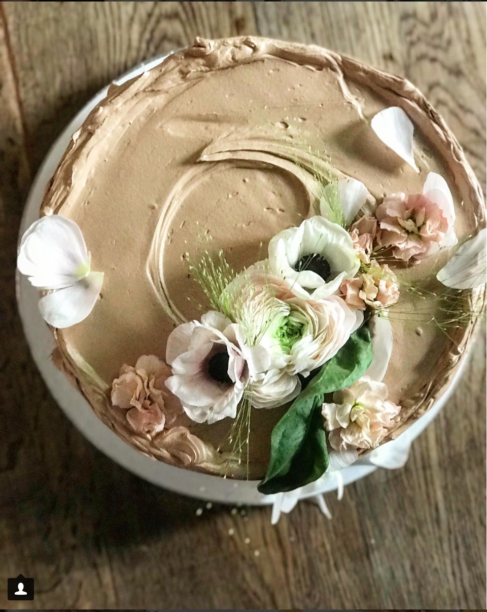 Old fashioned layer cake with fresh flowers on top. Beautiful cake styling from Violet bakery's Claire Ptak. Come see LET THEM EAT CAKE...VIOLET CAKES. #cakelover #violetbakery #violetcakes #claireptak #shabbychic #cakedecorating #letthemeatcake #bakingideas #bakingideas #cakestyling #cakequotes