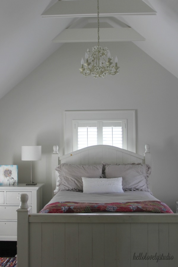 Grey walls in beautiful girls farmhouse bedroom. Modern Industrial Farmhouse Bedroom Design {2nd Floor Tour}. #modernfarmhouse #bedroom #industrialfarmhouse #greywalls #luxuriousfarmhouse #benjaminmooreplatinum #benjaminmoorestoningtongray