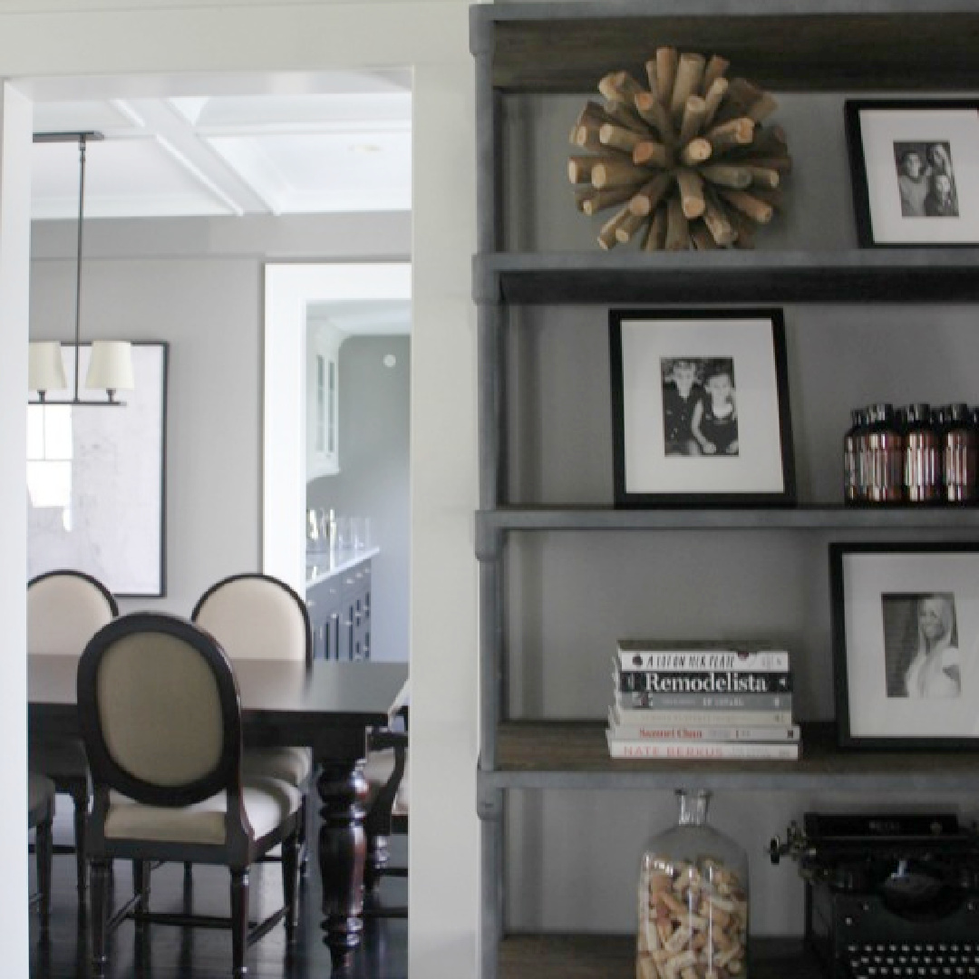 View into dining room in a modern farmhouse with industrial accents - Hello Lovely Studio.