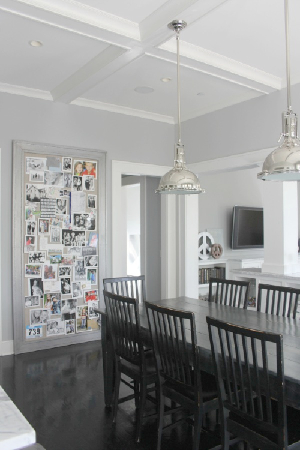 Breakfast room with harvest table and Stonington Gray walls in a modern farmhouse - Hello Lovely Studio.