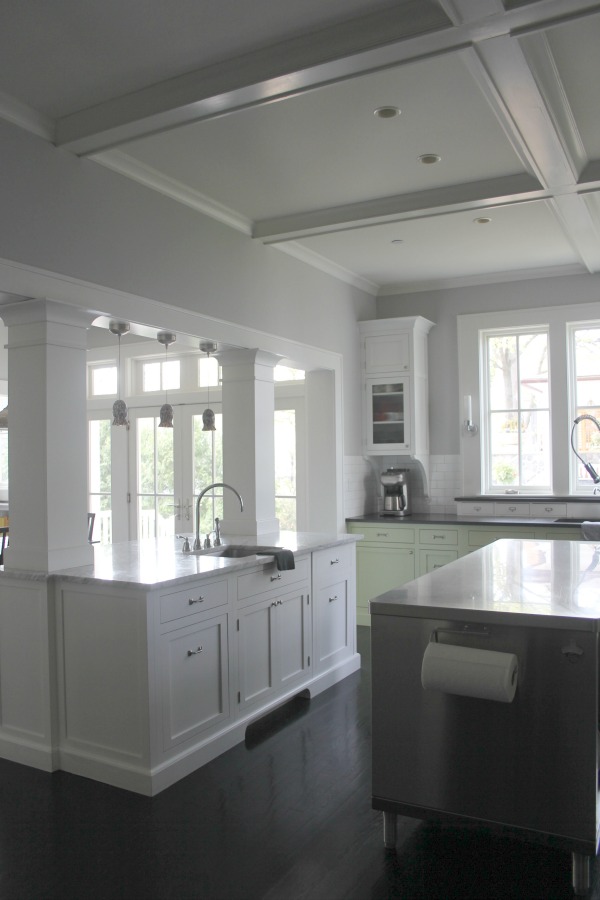 Industrial Chic Farmhouse Kitchen Inspiration with green cabinets, custom stainless island, and black stained flooring. #modernfarmhouse #kitchendesign #industrialfarmhouse #farmhousekitchen #benjaminmoorestoningtongray