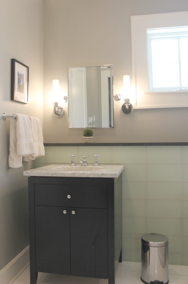 Black, grey, and light green master bathroom. Modern Industrial Farmhouse Bedroom Design {2nd Floor Tour}. #modernfarmhouse #bedroom #industrialfarmhouse #greywalls #luxuriousfarmhouse #benjaminmooreplatinum #benjaminmoorestoningtongray