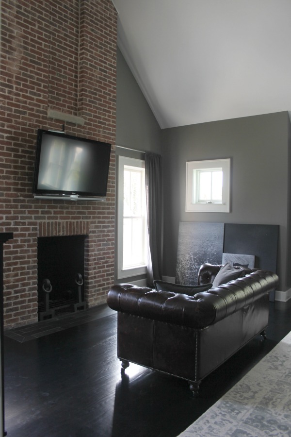 Floor to ceiling red brick fireplace in bedroom. Modern Industrial Farmhouse Bedroom Design {2nd Floor Tour}. #modernfarmhouse #bedroom #greywalls #luxuriousfarmhouse #benjaminmooreplatinum #benjaminmoorestoningtongray