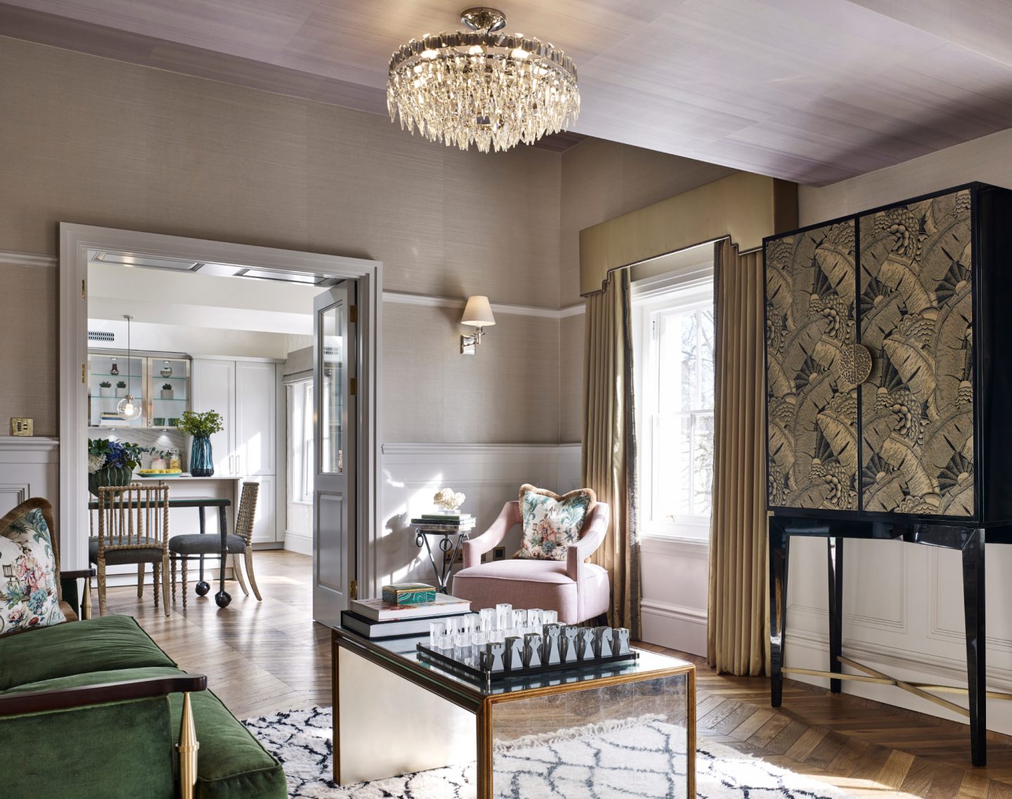 Sitting room in London apartment. Colorful Classic Decor in London Inspired by 'Out of Africa' - come see more from Studio L London! #britishcolornial #livingroom #pinkandgreen #elegantdecor #Londonapartment #interiordesigninspiration