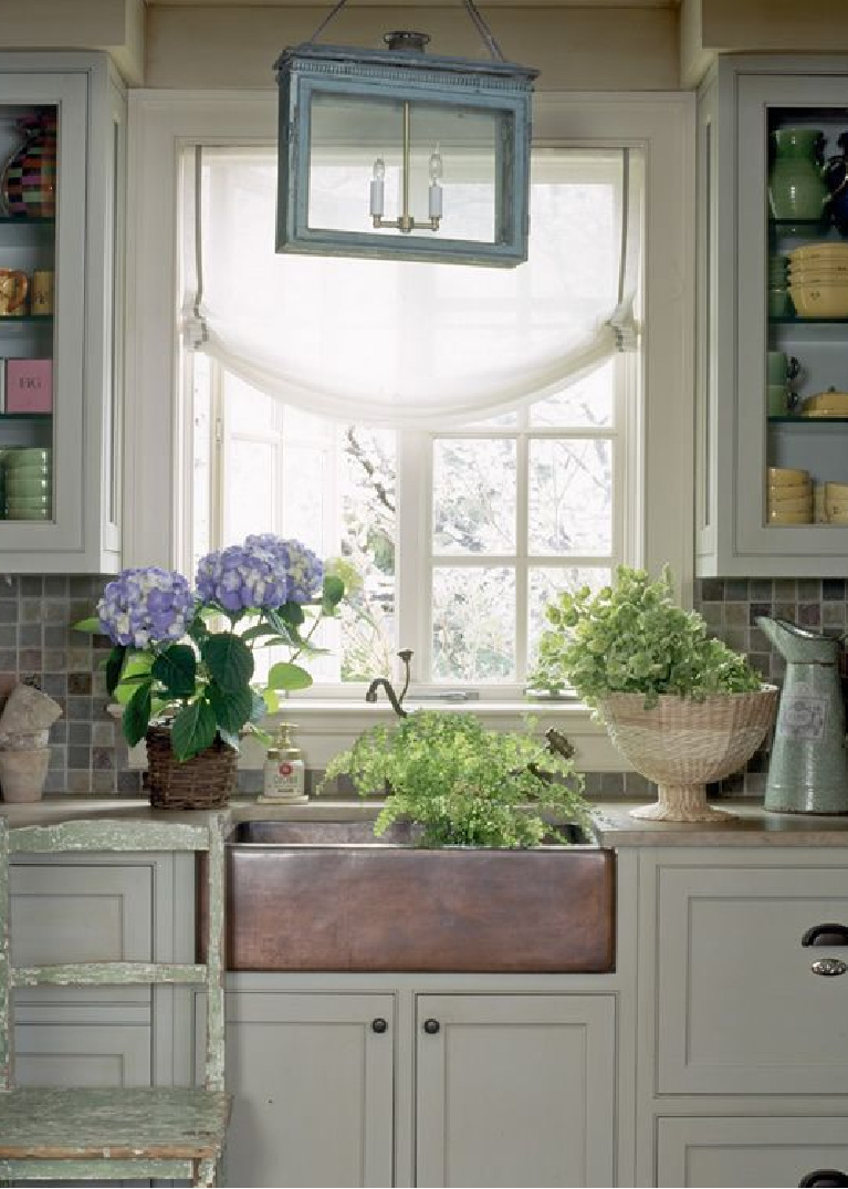 Solis Betancourt & Sherrill country kitchen with farm sink and vintage lantern pendant. #kitchendesign #countrykitchen #kitchendesign