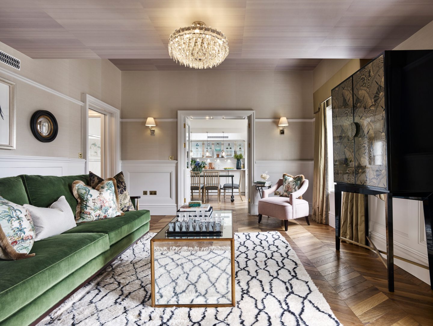 Sitting room in London apartment. Colorful Classic Decor in London Inspired by 'Out of Africa' - come see more from Studio L London! #britishcolornial #livingroom #pinkandgreen #elegantdecor #Londonapartment #interiordesigninspiration