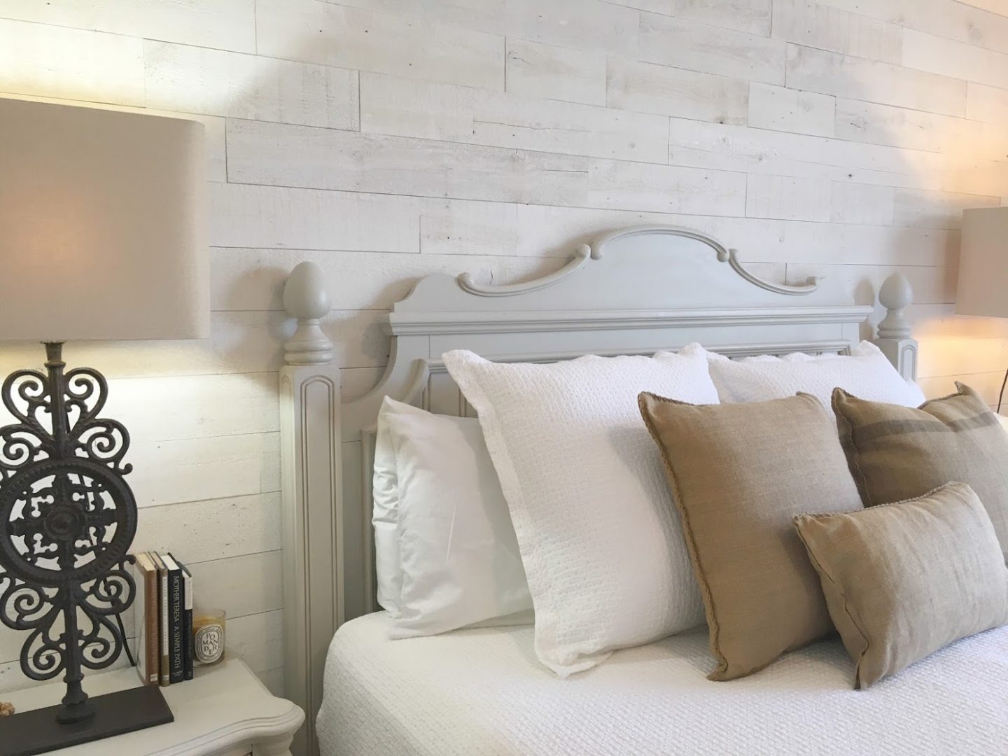 Nordic French white bedroom with light grey, linen, and white. Stikwood on wall, alder doors, cottage style furniture, and white oak flooring. #hellolovelystudio #bedroom #frenchcountry #nordicfrench #stikwood #serene #romantic #whitebedroom