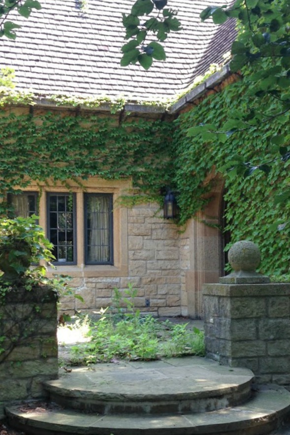 Stone exterior of a French country house covered with ivy. Hello Lovely Studio. #ivy #frenchcountry #frenchfarmhouse #hellolovelystudio #climbing