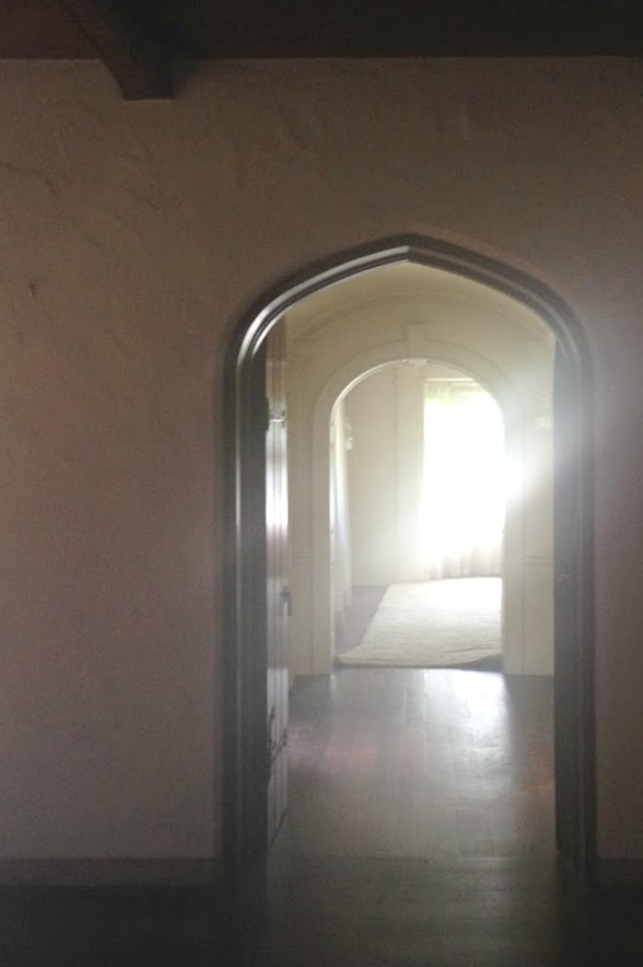 Gothic arch doorway in a 1930's French country cottage. Hello Lovely Studio