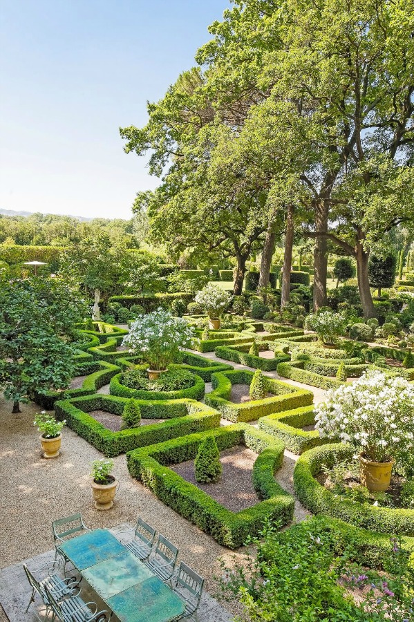 Sculptural formal gardens at a luxurious vacation home in France. See more of this Stunning French Château Near St-Rémy-de-Provence by Haven In. #frenchgarden #Provence #frenchchateau