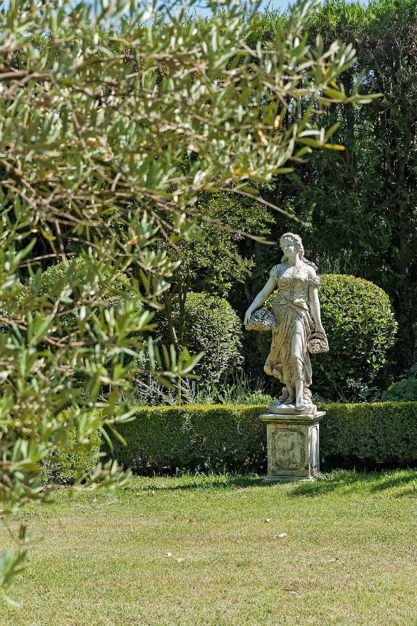French formal gardens and statue of young girl- see more of this Stunning French Château Near St-Rémy-de-Provence by Haven In. #frenchgarden #Provence #frenchchateau