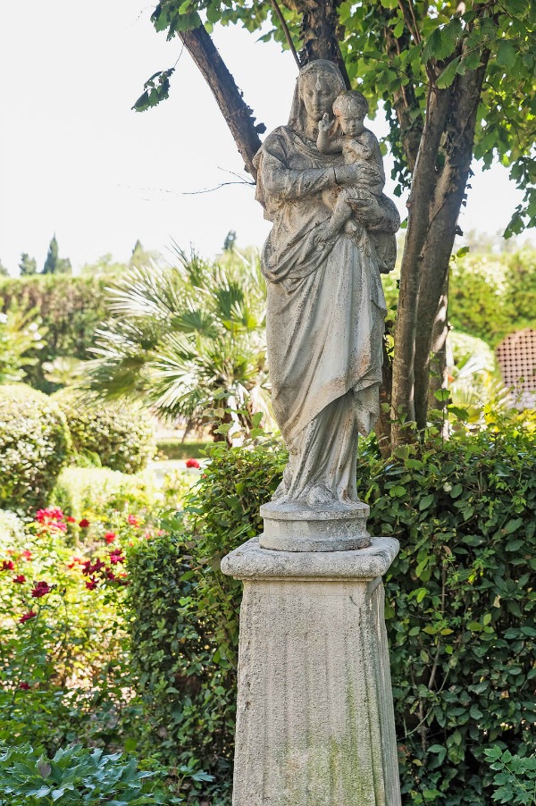 French formal gardens and statue of mother and child- see more of this Stunning French Château Near St-Rémy-de-Provence by Haven In. #frenchgarden #statues #frenchchateau