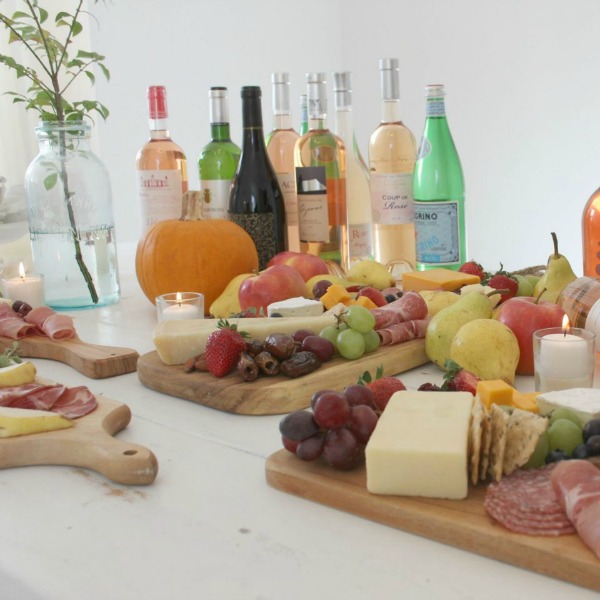 Easy Entertaining Idea With No Cooking or Baking! How to assemble a cheeseboard for a party or holiday. Let the food become the beautiful tablescape! Design/photo: Hello Lovely Studio. #hellolovelystudio #easyappetizer #easyentertaining #cheeseboard #wineandcheese #tablescape #simplerecipe #nocook #nobake #cocktailparty