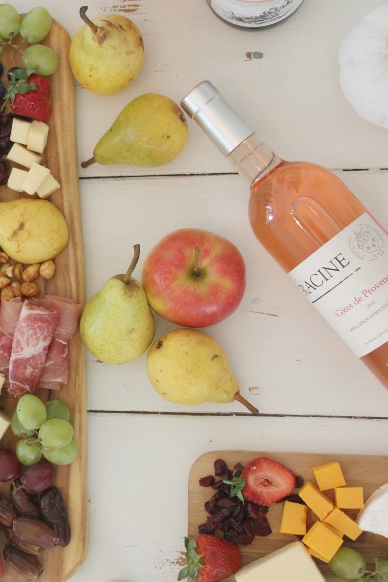 Wine and cheese fall tablescape. Hello Lovely Studio. #hellolovelystudio #falltablescape #wineandcheese #cheeseboard