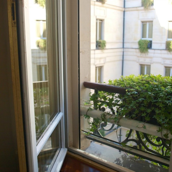 Paris window and ivy spilling out of a window box. #hellolovelystudio #Paris #windowbox #ivy