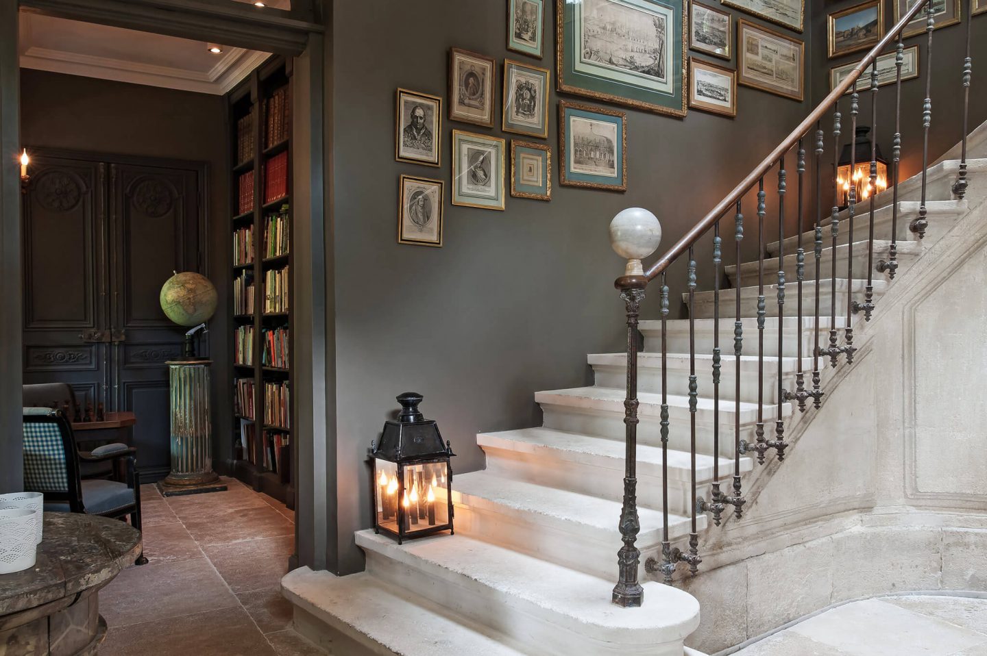 Stone staircase. Inspiring interiors, gardens, and art within this restored French chateau Avignon Hotel Particulier. The Serenity Suite is available to book through Haven In...come take a peek! #frenchchateau #avignon #provence #provencal #housetour #french #home #mansion #luxuryhotel #luxuryhome