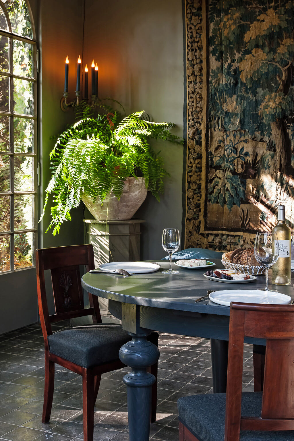 Blue dining room in Provence. Come see a Breathtaking French Château Tour in Provence With Photo Gallery of Historical Architecture, Dramatic Eclectic Interiors & Oddities!