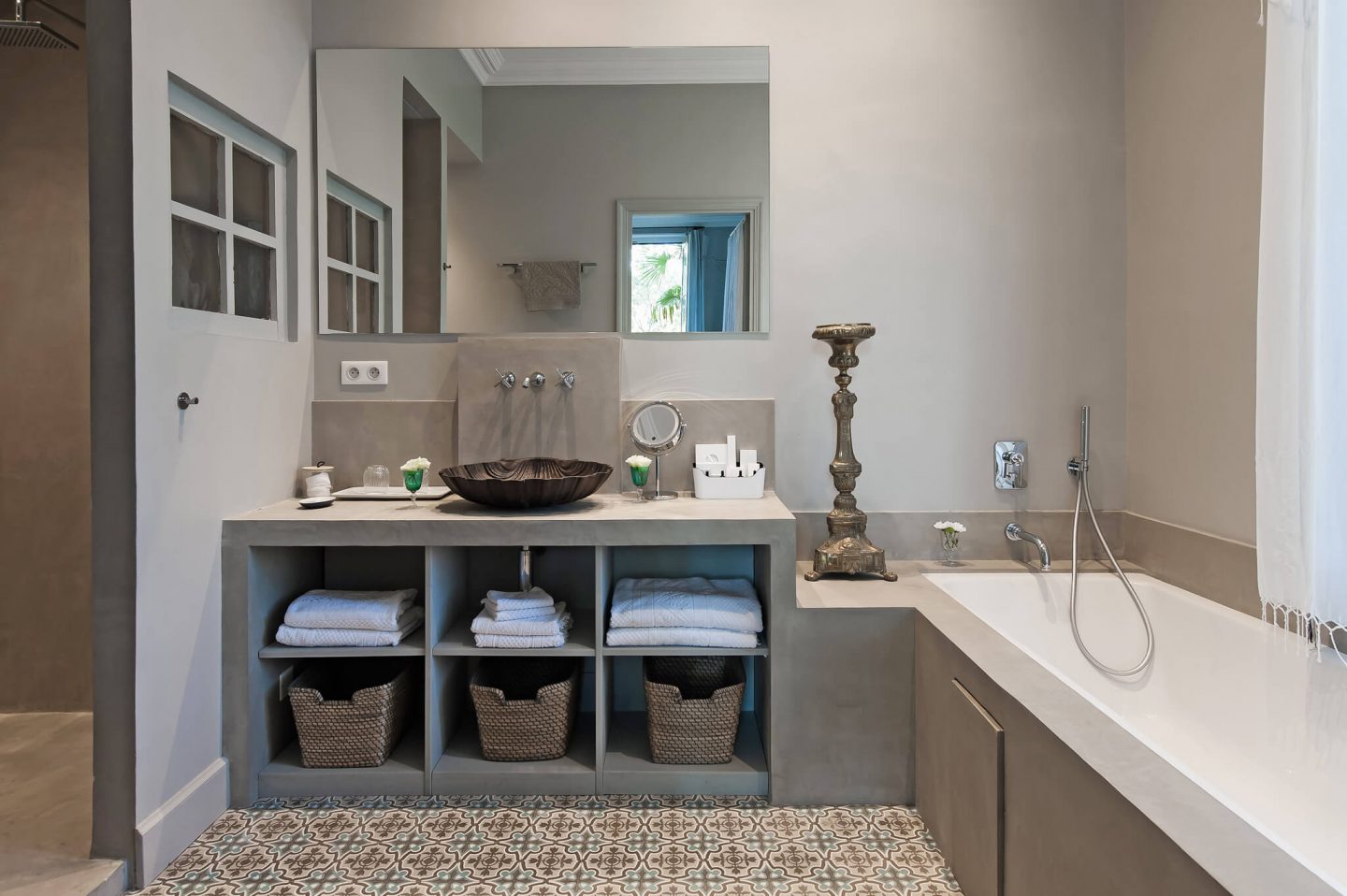 Airy, spare, and neutral modern French bathroom in a restored chateau. Serene French Country Style interior design inspiration. The Serenity Suite at Avignon Hôtel Particulier. Luxurious and timeless restored 19th century French chateau in the South of France. Provencal romance, traditional architecture, modern French design, unique art, and European antiques. Photo: Haven In.