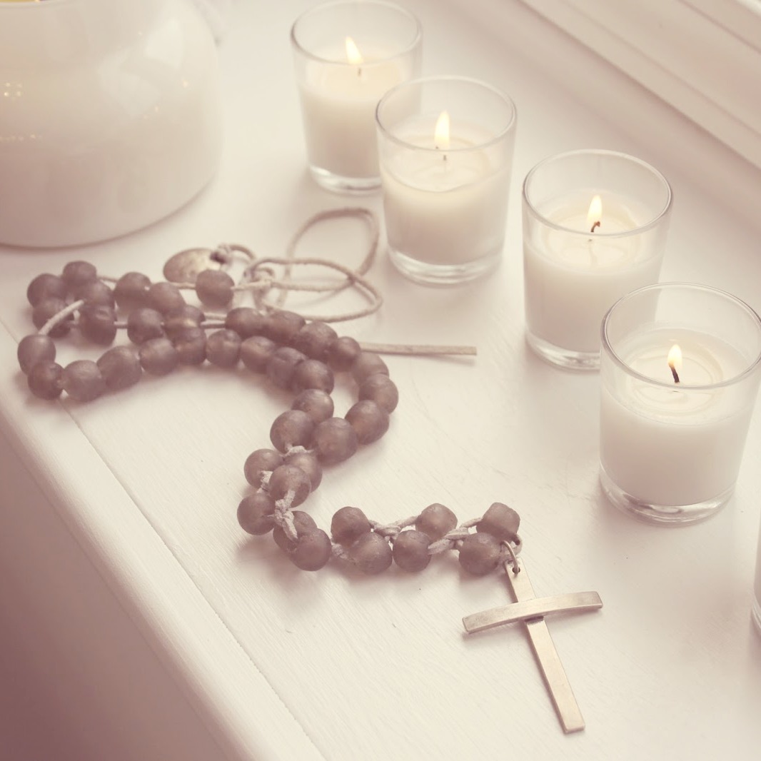 Rosary with African glass beads (necklace design by Asa Daxberg) and candlelight. Hello Lovely Studio. #hellolovelystudio #rosary #faith