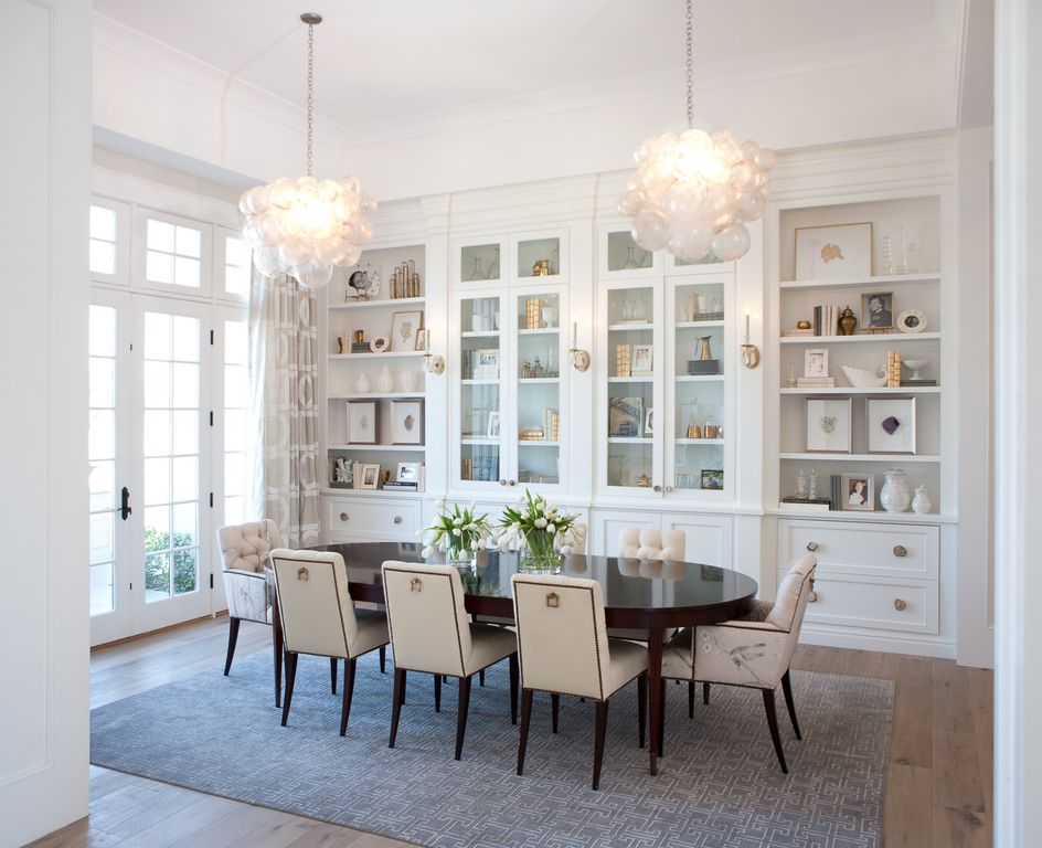 White dining room with lofty ceiling. and French doors. Modern Chic Home in the Southwest. E&A Builders. Pinnacle Conceptions. Jaimee Rose Interiors. #modern #French #housedesign #luxuryhome