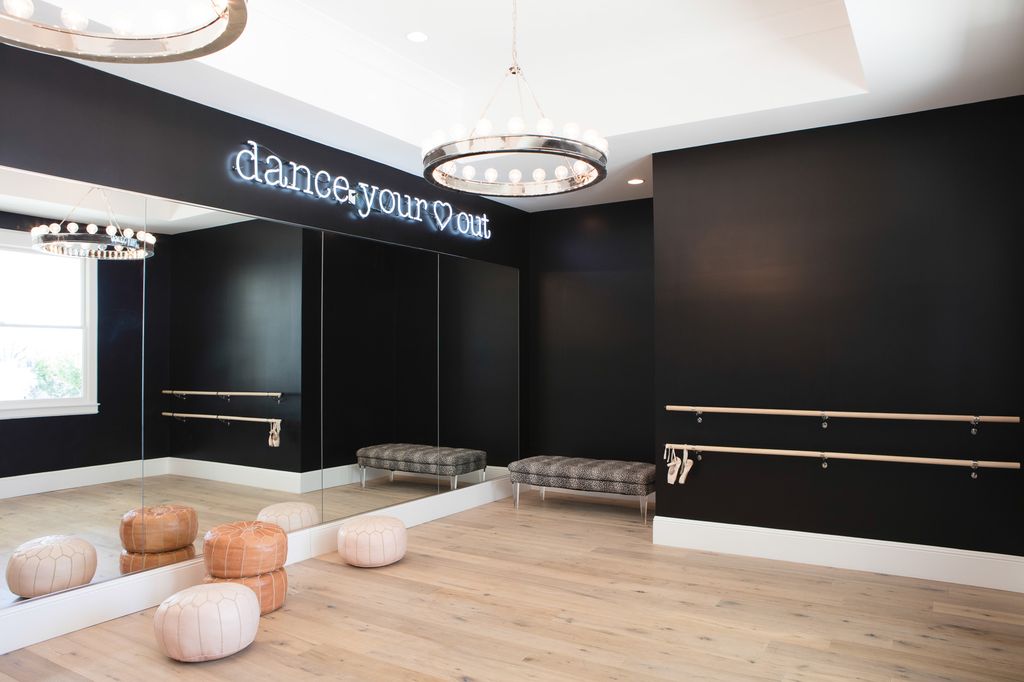 Dance studio with black walls and Moroccan poufs. Modern Chic Home in the Southwest. E&A Builders. Pinnacle Conceptions. Jaimee Rose Interiors. #modern #French #housedesign #luxuryhome