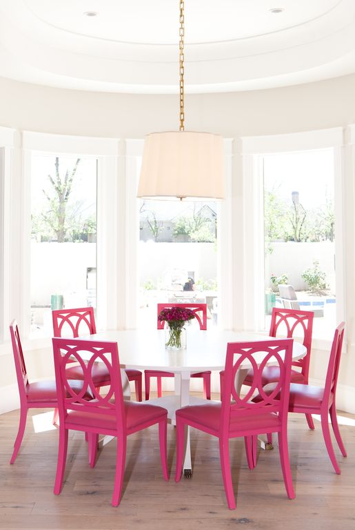 Fuchsia pink dining chairs in breakfast room. Modern Chic Home in the Southwest. E&A Builders. Pinnacle Conceptions. Jaimee Rose Interiors. #modern #French #housedesign #luxuryhome