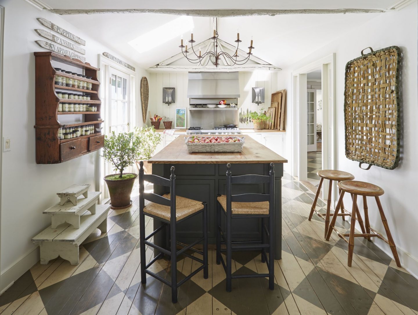 Nora Murphy country kitchen with checkerboard floor and tobacco basket on wall. Nora Murphy Country Style to Inspire! #noramurphy #countrykitchen #historickitchen #rusticdecor #countrystyle #farmhousekitchen